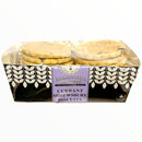 Packaged Currant Shrewsbury biscuits with a decorative box on a white background