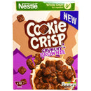 Box of Nestle Cookie Crisp Crunchy Brownie cereal with a purple and brown design.