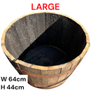 Large wooden barrel with black interior on a white background