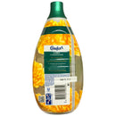 Bottle of Comfort fabric conditioner with floral design on a white background